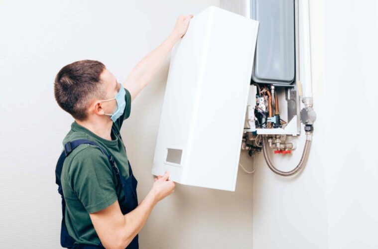 plumber-attaches-trying-fix-problem-with-residential-heating-equipment-repair-gas-boiler